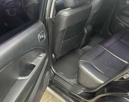 Черный Мицубиси Аутлендер, объемом двигателя 2.4 л и пробегом 277 тыс. км за 6700 $, фото 7 на Automoto.ua