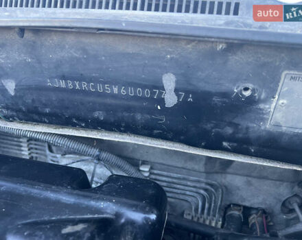 Черный Мицубиси Аутлендер, объемом двигателя 2.38 л и пробегом 230 тыс. км за 5350 $, фото 18 на Automoto.ua