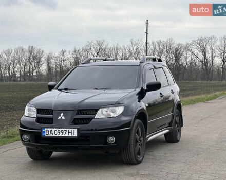 Черный Мицубиси Аутлендер, объемом двигателя 2 л и пробегом 230 тыс. км за 6300 $, фото 14 на Automoto.ua