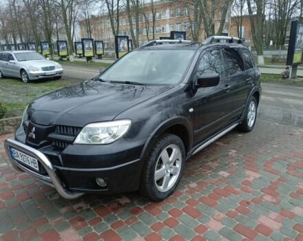 Черный Мицубиси Аутлендер, объемом двигателя 2 л и пробегом 200 тыс. км за 5100 $, фото 8 на Automoto.ua