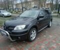 Черный Мицубиси Аутлендер, объемом двигателя 2 л и пробегом 200 тыс. км за 5100 $, фото 8 на Automoto.ua