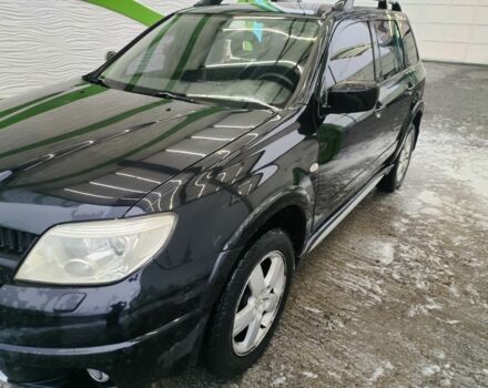 Чорний Міцубісі Аутлендер, об'ємом двигуна 2.4 л та пробігом 360 тис. км за 5200 $, фото 1 на Automoto.ua