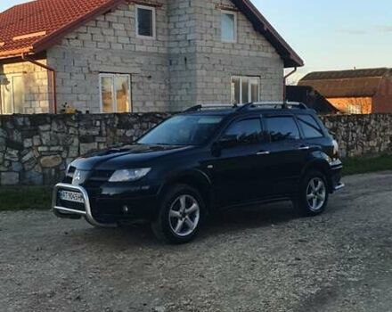 Міцубісі Аутлендер 2006 у Івано-Франківську на Automoto.ua Чорний Міцубісі Аутлендер, об'ємом двигуна 2 л та пробігом 263 тис. км за 7250 $, фото 18 на Automoto.ua