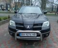 Черный Мицубиси Аутлендер, объемом двигателя 2 л и пробегом 200 тыс. км за 5100 $, фото 7 на Automoto.ua