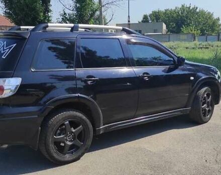 Черный Мицубиси Аутлендер, объемом двигателя 2 л и пробегом 216 тыс. км за 5600 $, фото 4 на Automoto.ua