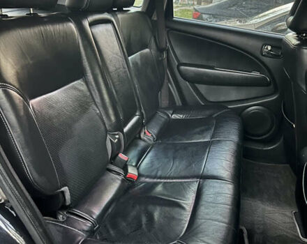 Чорний Міцубісі Аутлендер, об'ємом двигуна 2.38 л та пробігом 247 тис. км за 5499 $, фото 62 на Automoto.ua