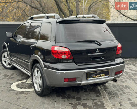 Черный Мицубиси Аутлендер, объемом двигателя 2.4 л и пробегом 242 тыс. км за 6800 $, фото 14 на Automoto.ua