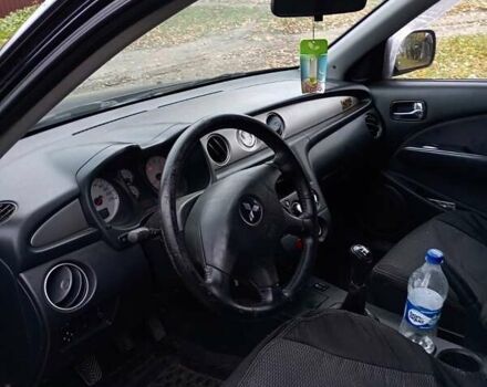 Чорний Міцубісі Аутлендер, об'ємом двигуна 2 л та пробігом 320 тис. км за 4500 $, фото 3 на Automoto.ua