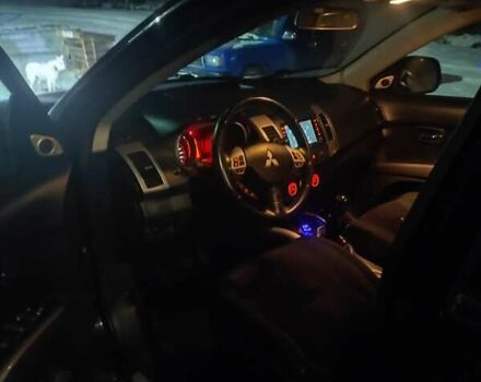 Чорний Міцубісі Аутлендер, об'ємом двигуна 2 л та пробігом 283 тис. км за 9000 $, фото 7 на Automoto.ua