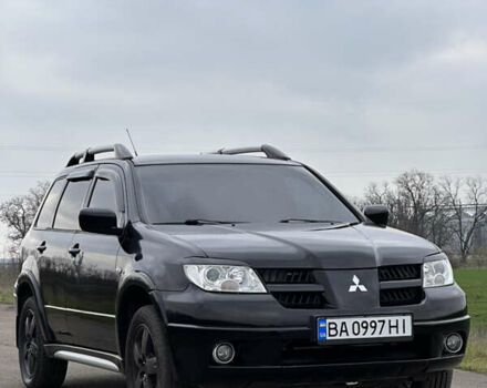 Черный Мицубиси Аутлендер, объемом двигателя 2 л и пробегом 230 тыс. км за 6300 $, фото 10 на Automoto.ua