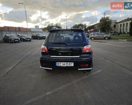 Чорний Міцубісі Аутлендер, об'ємом двигуна 2 л та пробігом 207 тис. км за 6900 $, фото 6 на Automoto.ua