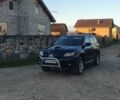 Міцубісі Аутлендер 2006 у Івано-Франківську на Automoto.ua Чорний Міцубісі Аутлендер, об'ємом двигуна 2 л та пробігом 263 тис. км за 7250 $, фото 16 на Automoto.ua