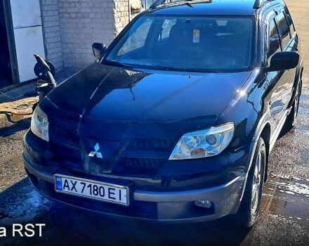 Черный Мицубиси Аутлендер, объемом двигателя 2.4 л и пробегом 185 тыс. км за 7500 $, фото 8 на Automoto.ua