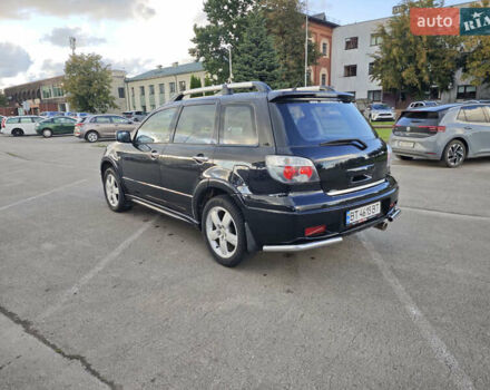Чорний Міцубісі Аутлендер, об'ємом двигуна 2 л та пробігом 207 тис. км за 6900 $, фото 7 на Automoto.ua