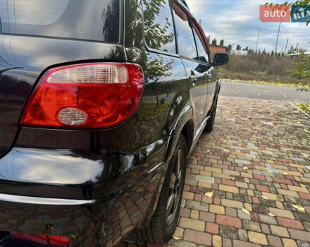 Чорний Міцубісі Аутлендер, об'ємом двигуна 2.38 л та пробігом 247 тис. км за 5499 $, фото 24 на Automoto.ua