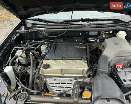 Міцубісі Аутлендер 2006 у Василькове на Automoto.ua Чорний Міцубісі Аутлендер, об'ємом двигуна 2.38 л та пробігом 220 тис. км за 4300 $, фото 6 на Automoto.ua