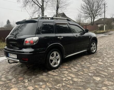 Черный Мицубиси Аутлендер, объемом двигателя 2.4 л и пробегом 310 тыс. км за 5300 $, фото 3 на Automoto.ua