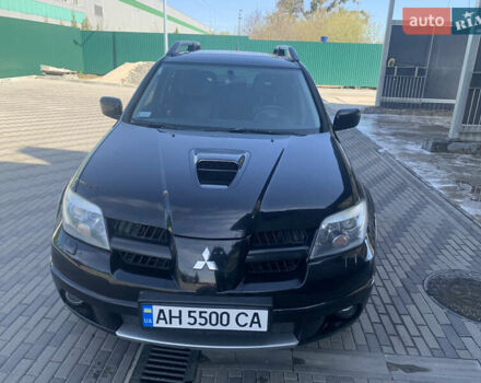 Черный Мицубиси Аутлендер, объемом двигателя 2 л и пробегом 212 тыс. км за 6000 $, фото 8 на Automoto.ua