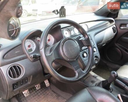 Черный Мицубиси Аутлендер, объемом двигателя 2 л и пробегом 216 тыс. км за 5600 $, фото 5 на Automoto.ua