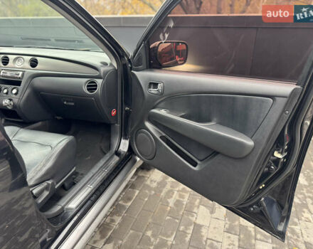 Черный Мицубиси Аутлендер, объемом двигателя 2.4 л и пробегом 242 тыс. км за 6800 $, фото 51 на Automoto.ua