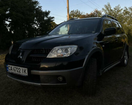 Мицубиси Аутлендер 2006 в Чернобае на Automoto.ua Черный Мицубиси Аутлендер, объемом двигателя 2.38 л и пробегом 278 тыс. км за 5300 $, фото 16 на Automoto.ua