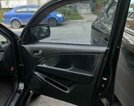 Чорний Міцубісі Аутлендер, об'ємом двигуна 2.38 л та пробігом 247 тис. км за 5499 $, фото 64 на Automoto.ua