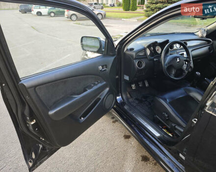 Чорний Міцубісі Аутлендер, об'ємом двигуна 2 л та пробігом 207 тис. км за 6900 $, фото 14 на Automoto.ua