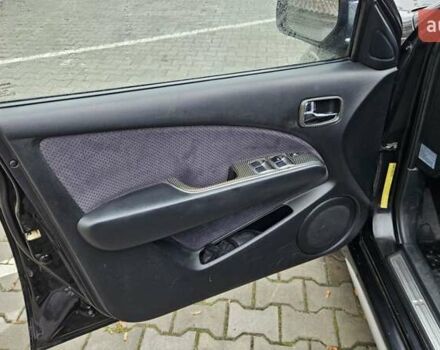 Черный Мицубиси Аутлендер, объемом двигателя 2.4 л и пробегом 167 тыс. км за 6150 $, фото 25 на Automoto.ua