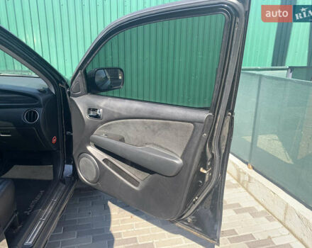 Черный Мицубиси Аутлендер, объемом двигателя 2 л и пробегом 212 тыс. км за 6000 $, фото 29 на Automoto.ua