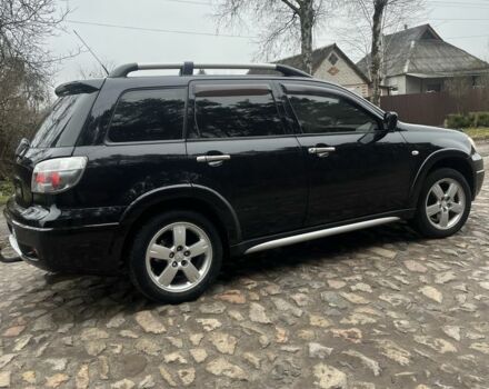 Черный Мицубиси Аутлендер, объемом двигателя 2.4 л и пробегом 310 тыс. км за 5300 $, фото 4 на Automoto.ua