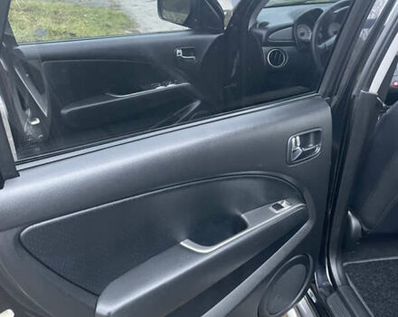 Черный Мицубиси Аутлендер, объемом двигателя 2 л и пробегом 130 тыс. км за 6999 $, фото 14 на Automoto.ua