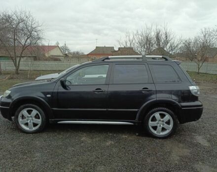 Черный Мицубиси Аутлендер, объемом двигателя 2 л и пробегом 200 тыс. км за 5100 $, фото 13 на Automoto.ua