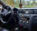 Чорний Міцубісі Аутлендер, об'ємом двигуна 2 л та пробігом 170 тис. км за 9000 $, фото 5 на Automoto.ua