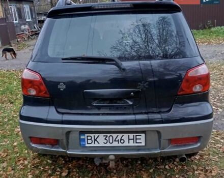 Чорний Міцубісі Аутлендер, об'ємом двигуна 2 л та пробігом 320 тис. км за 4500 $, фото 2 на Automoto.ua
