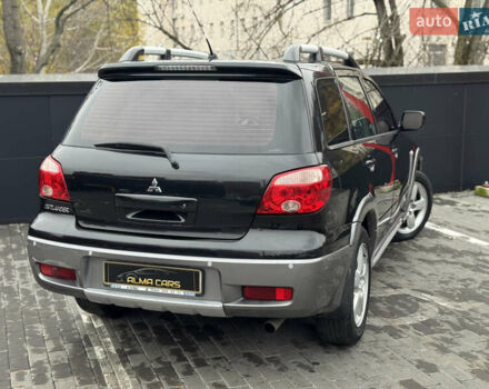 Черный Мицубиси Аутлендер, объемом двигателя 2.4 л и пробегом 242 тыс. км за 6800 $, фото 10 на Automoto.ua
