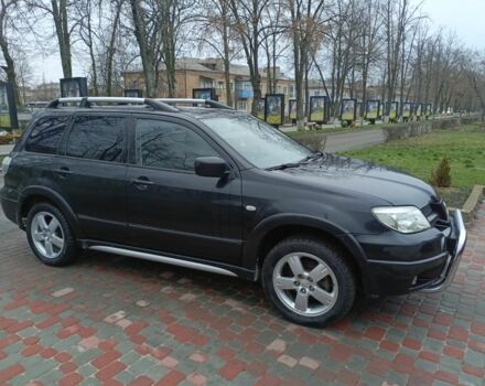 Черный Мицубиси Аутлендер, объемом двигателя 2 л и пробегом 200 тыс. км за 5100 $, фото 6 на Automoto.ua