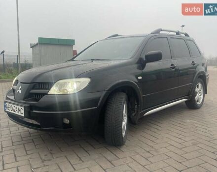 Черный Мицубиси Аутлендер, объемом двигателя 2.4 л и пробегом 277 тыс. км за 6700 $, фото 10 на Automoto.ua