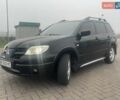 Черный Мицубиси Аутлендер, объемом двигателя 2.4 л и пробегом 277 тыс. км за 6700 $, фото 10 на Automoto.ua