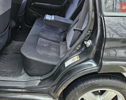 Черный Мицубиси Аутлендер, объемом двигателя 2.4 л и пробегом 167 тыс. км за 6150 $, фото 24 на Automoto.ua