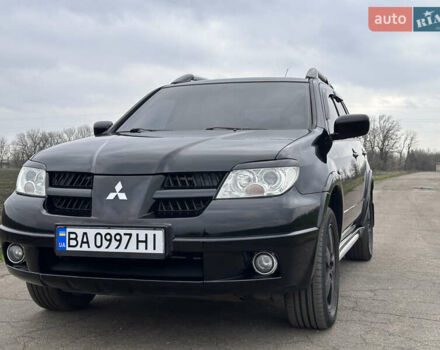 Черный Мицубиси Аутлендер, объемом двигателя 2 л и пробегом 230 тыс. км за 6300 $, фото 9 на Automoto.ua