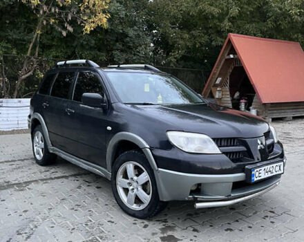 Черный Мицубиси Аутлендер, объемом двигателя 2 л и пробегом 280 тыс. км за 4999 $, фото 5 на Automoto.ua