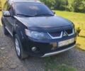 Чорний Міцубісі Аутлендер, об'ємом двигуна 2 л та пробігом 283 тис. км за 9000 $, фото 1 на Automoto.ua