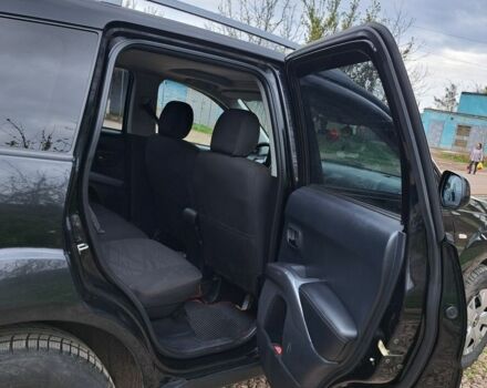 Черный Мицубиси Аутлендер, объемом двигателя 2 л и пробегом 280 тыс. км за 10500 $, фото 3 на Automoto.ua