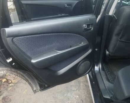 Черный Мицубиси Аутлендер, объемом двигателя 2.4 л и пробегом 280 тыс. км за 5455 $, фото 9 на Automoto.ua