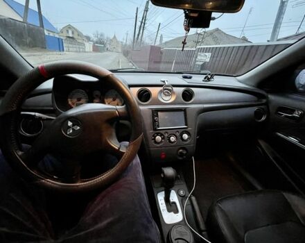 Черный Мицубиси Аутлендер, объемом двигателя 2.4 л и пробегом 234 тыс. км за 5499 $, фото 11 на Automoto.ua