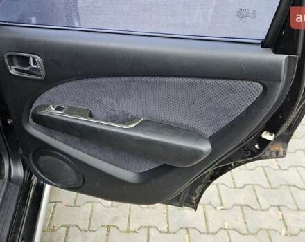 Черный Мицубиси Аутлендер, объемом двигателя 2.4 л и пробегом 167 тыс. км за 6150 $, фото 14 на Automoto.ua