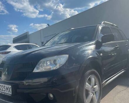 Черный Мицубиси Аутлендер, объемом двигателя 2.38 л и пробегом 260 тыс. км за 5000 $, фото 1 на Automoto.ua
