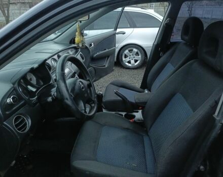 Черный Мицубиси Аутлендер, объемом двигателя 2 л и пробегом 200 тыс. км за 5100 $, фото 18 на Automoto.ua