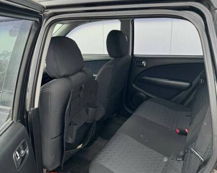 Черный Мицубиси Аутлендер, объемом двигателя 2.38 л и пробегом 260 тыс. км за 5000 $, фото 7 на Automoto.ua