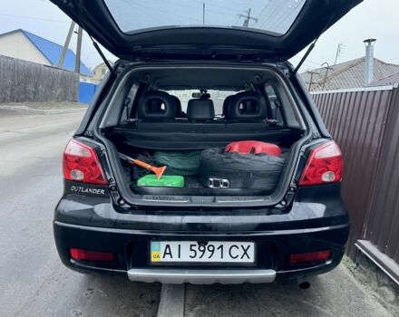 Черный Мицубиси Аутлендер, объемом двигателя 2.4 л и пробегом 234 тыс. км за 5499 $, фото 8 на Automoto.ua